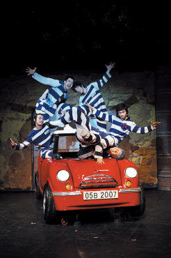 DRIVEN INSANE Five dancing convicts ride to freedom.