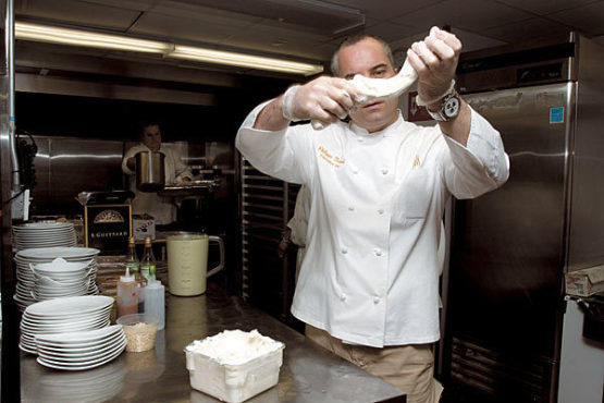 Ilili owner Philippe Massoud stretches chewy ice cream.