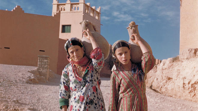 AT_morocco_jewishmuseum_2010press_Elias Harrus_ mother and daughter carrying jugs of water from the well, Tinghir, 1958_© Beit Hatfutsot, Tel Aviv.jpg