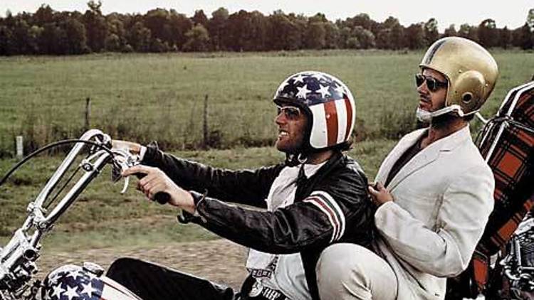 BSTARS AND STRIPES FOREVER Fonda and Nicholson raise some helmet.