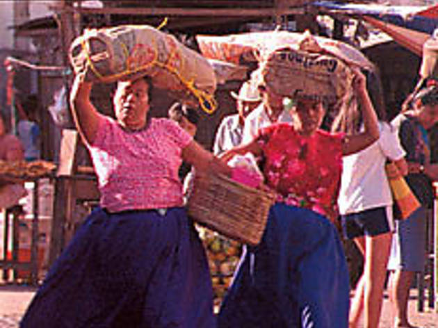 MARKET ECONOMY Zapotec women balance the goods MARKET ECONOMY Zapotec women balance the goods.