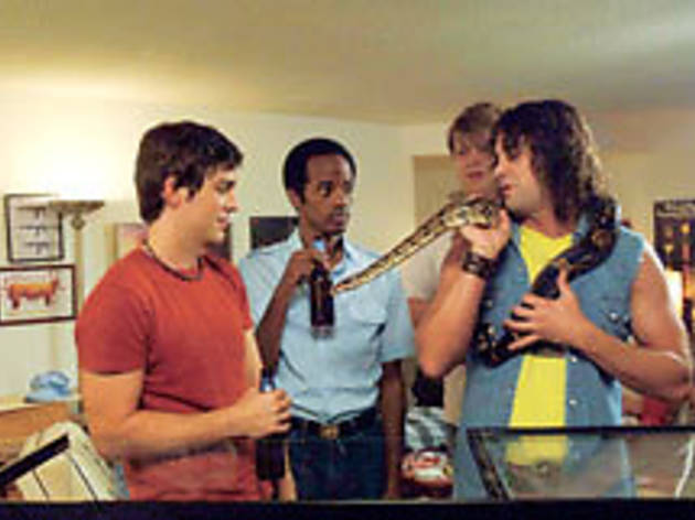 SNAKE GUYS Dean, left, and Sheridan party with a boa SNAKE GUYS Dean, left, and Sheridan party with a boa.