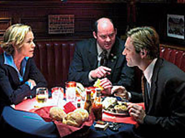 FOAM BOOTH Eckhart, right, rails against righteousness with the other merchants... FOAM BOOTH Eckhart, right, rails against righteousness with the other merchants of death.