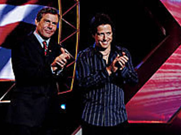 CUT THE CLAP Quaid, left, and Grant show their fake appreciation CUT THE CLAP Quaid, left, and Grant show their fake appreciation.
