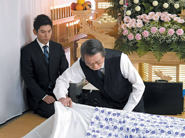 DEATH BECOMES YOU Motoki, left, learns from mortician Yamazaki DEATH BECOMES YOU Motoki, left, learns from mortician Yamazaki.