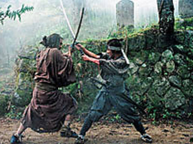 CROSSED SWORDS Ozawa, left, and Nagase fight to the finish CROSSED SWORDS Ozawa, left, and Nagase fight to the finish.