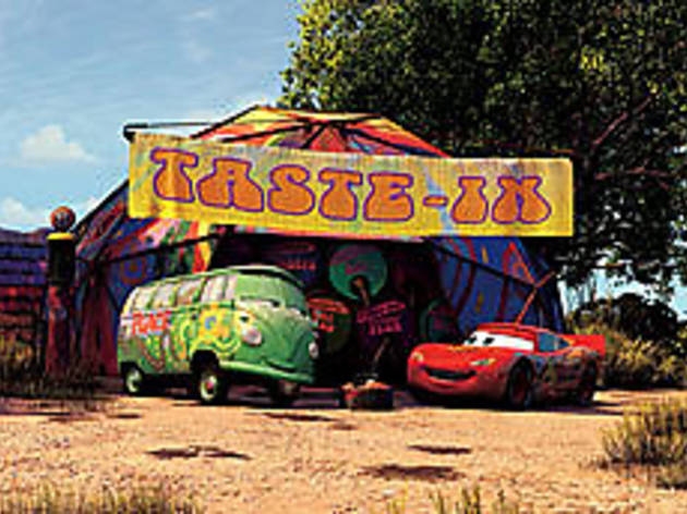 SMILES PER GALLON George Carlin's bus makes love, not war SMILES PER GALLON George Carlin's bus makes love, not war.