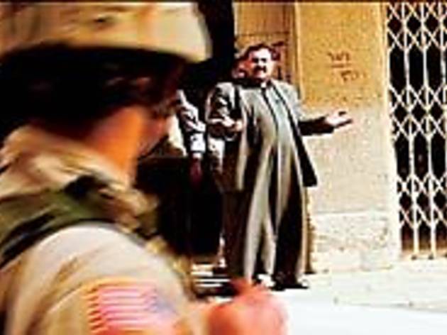 BETWEEN IRAQ AND A HARD PLACE Soldiers and citizens try to keep the peace BETWEEN IRAQ AND A HARD PLACE Soldiers and citizens try to keep the peace.