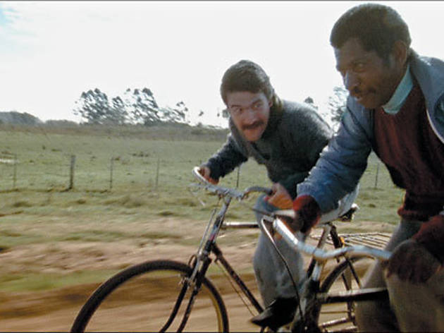 UNEASY RIDERS Troncoso, left, and Silva try to pedal away their anxiety UNEASY RIDERS Troncoso, left, and Silva try to pedal away their anxiety.