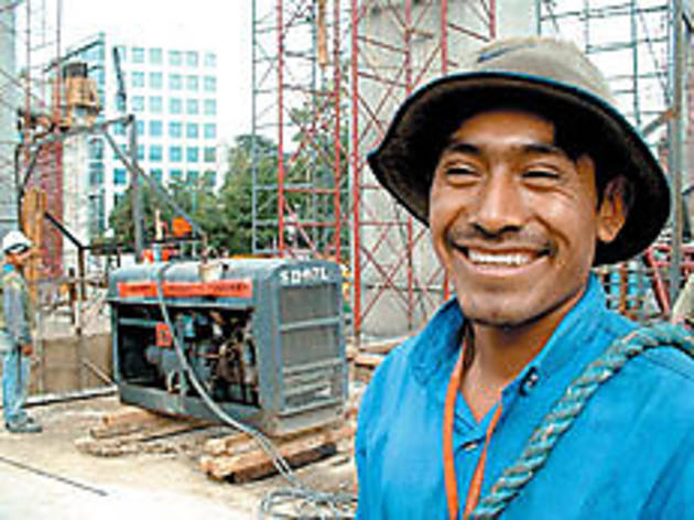 EVE OF CONSTRUCTION Smiles can't mask hellish conditions EVE OF CONSTRUCTION Smiles can't mask hellish conditions.