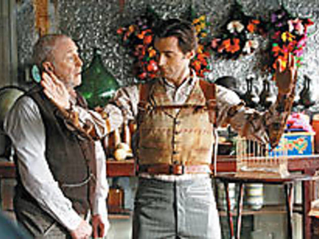SOMETHING UP HIS SLEEVE Caine, left, teaches Jackman an old trick SOMETHING UP HIS SLEEVE Caine, left, teaches Jackman an old trick.