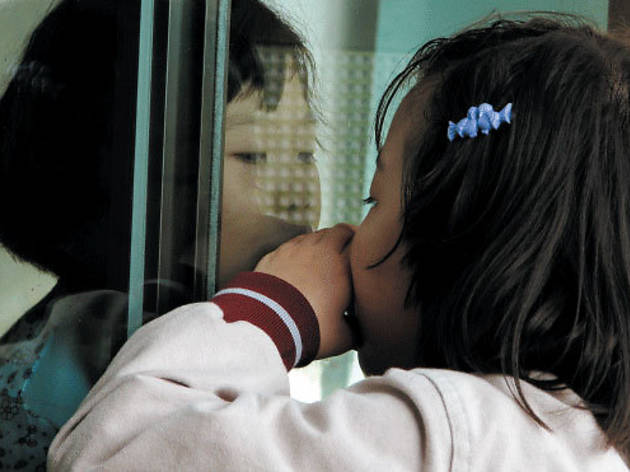 NO PANE, NO GAIN Kim Song-hee, left, peers through the window at her big sister NO PANE, NO GAIN Kim Song-hee, left, peers through the window at her big sister.