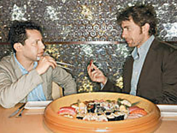 ROLL CALL Sasha Issenberg (left) and Trevor Corson dish on fish at Morimoto