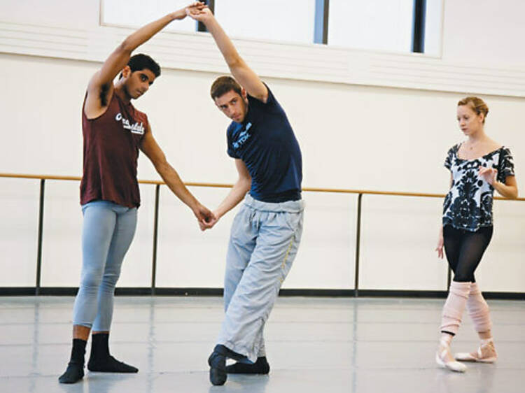 SHAPING UP Maria Kowroski looks on as Douglas Lee, center, works out a step with Amar Ramasar.