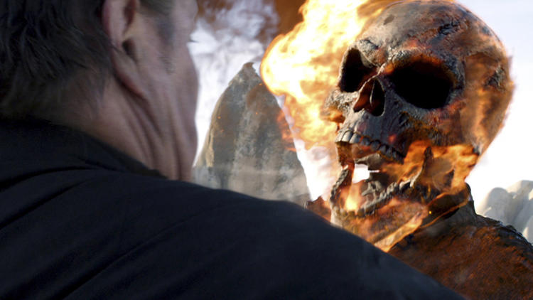 A hotheaded Nicolas Cage, right, in Ghost Rider: Spirit of Vengeance