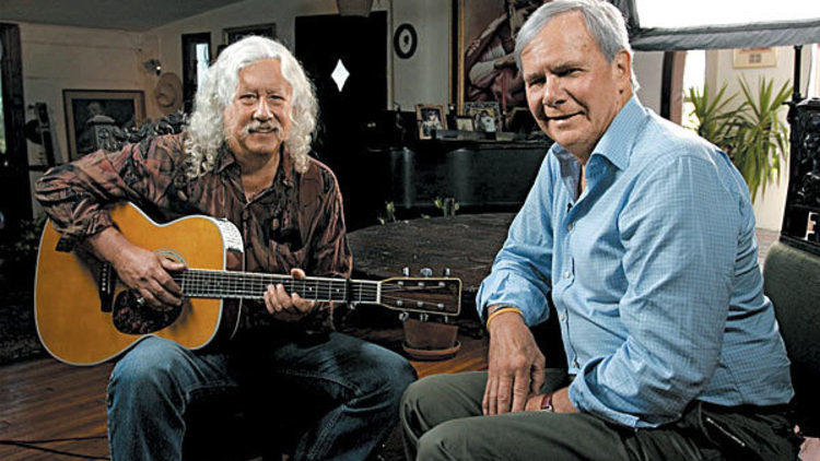 Arlo Guthrie, left, reminisces with Tom Brokaw
