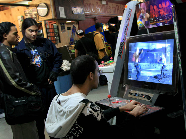 Play video games at Chinatown Fair Arcade