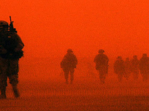 RED DESERT U.S. troops tromp across a colorful battlefield RED DESERT U.S. troops tromp across a colorful battlefield.
