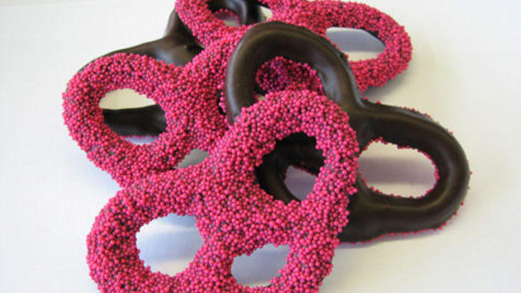 Dark-Belgian-chocolate-covered pretzels with pink sprinkles, half pound $15, at Mansoura Pastries (515 Kings Hwy between 2nd and 3rd Sts, Midwood,...