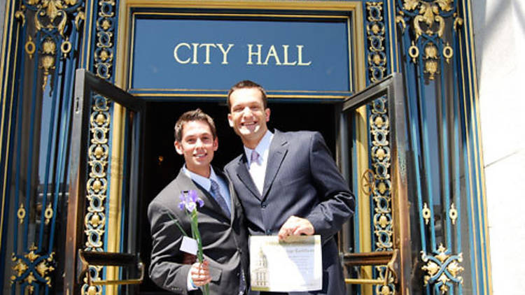 WEDDED BLISS A gay couple celebrate their nuptials.