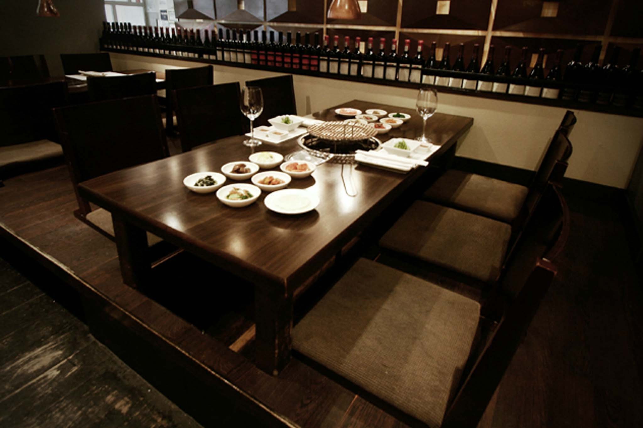 restaurant table with korean bbq grill