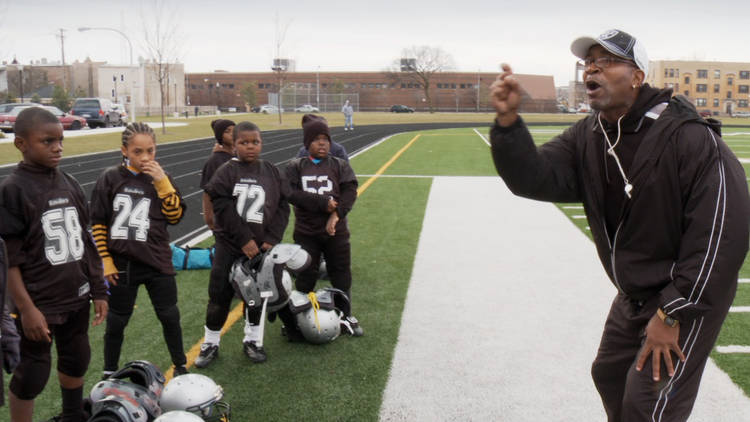 A coach fires up his young players in Head Games