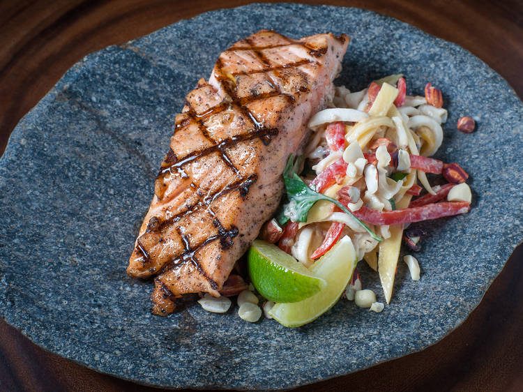 Wild salmon with coconut pad thai at Hu Kitchen