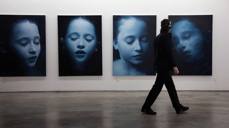 Gottfried Helnwein admires his work in Gottfried Helnwein and the Dreaming Child