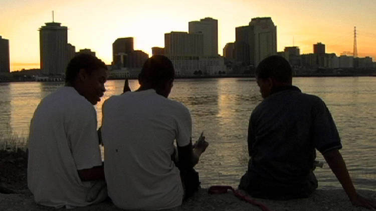 Three brothers check out the New Orleans skyline in Tchoupitoulas