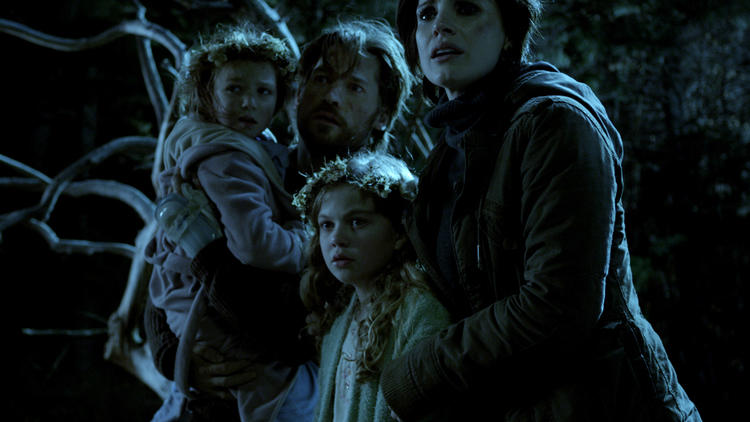 Left to right: Isabelle Nelisse, Nikolaj Coster-Waldau, Megan Charpentier and Jessica Chastain in Mama