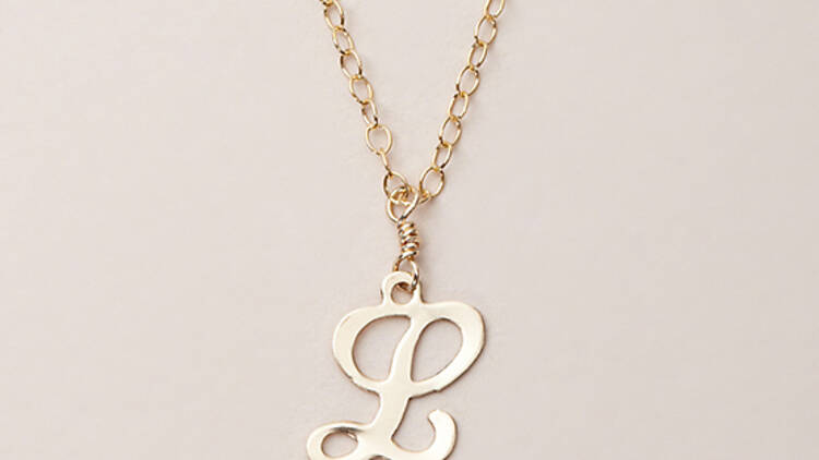 Delicate Raymond mini cutout initial necklace, $18 (was $45)