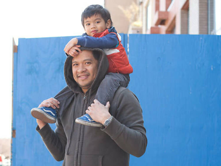 Public eye: John Divinagracia, 37,  and Santi, 3