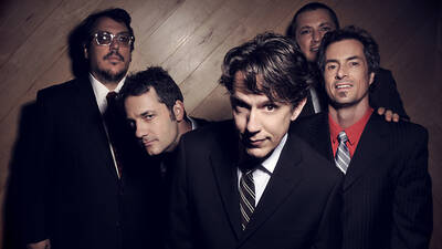 They Might Be Giants The five members of They Might Be Giants.