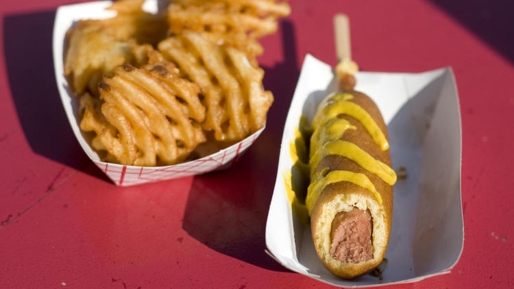 Corn dog and waffle fries at Ruby's