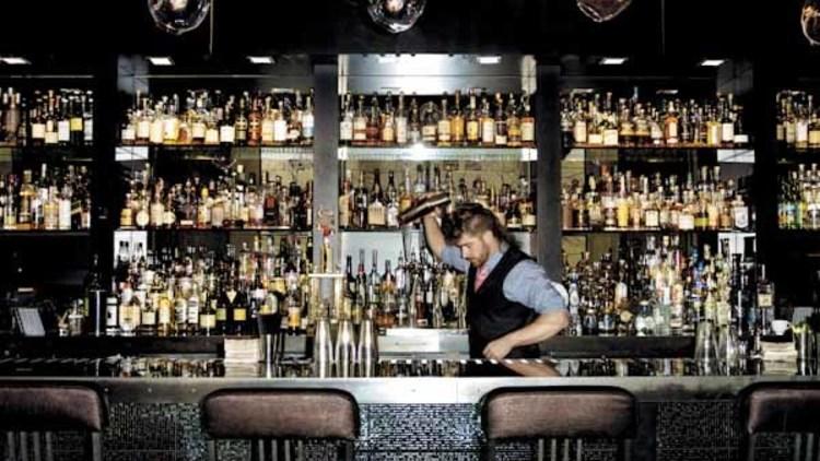 Sable Kitchen and Bar head bartender Mike Ryan shakes up a drink.