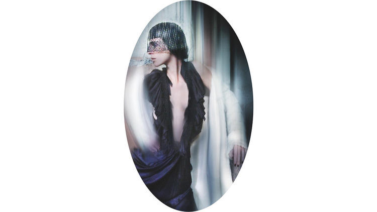 Hat - Philip Treacy, c. 2004. Coat - Louis Vuitton, A/W 2004. Dress - Wunderkind, S/S 2006. Worn to the film premiere of ‘The Phantom of the Opera’, 2004 (© Nick Knight)