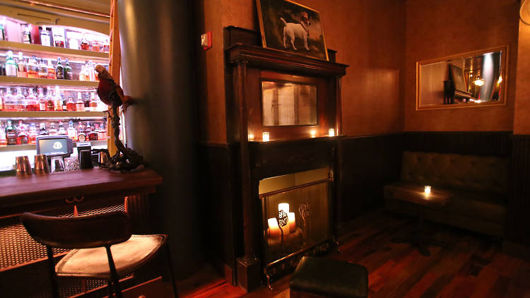 Getting cozy in a bar with a fireplace
