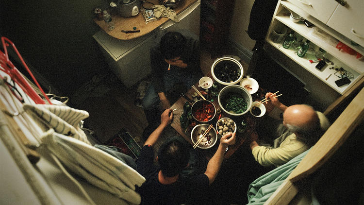 Look inside the apartments of Canal Street at "A Floating Population: Chinatown Photographs"