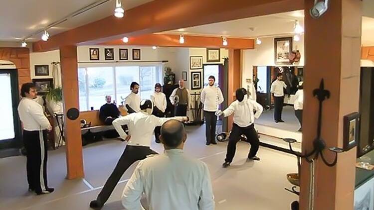 Beginners' fencing class at Martinez Academy of Arms