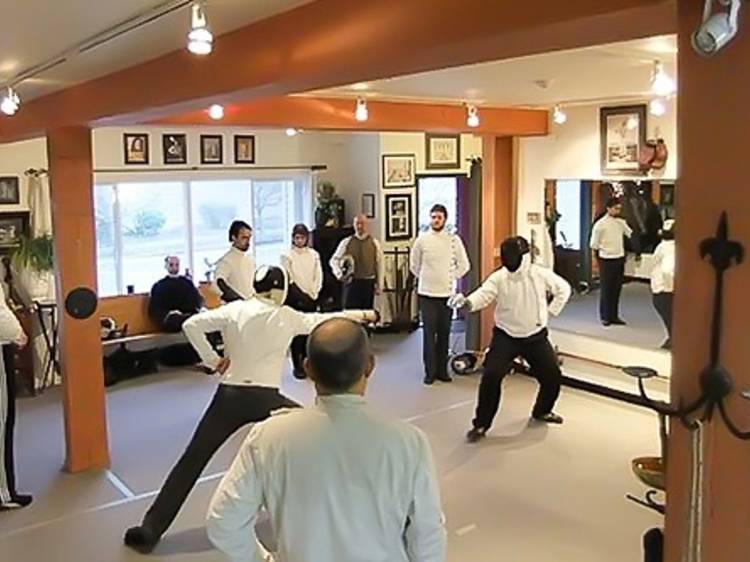 Beginners' fencing class at Martinez Academy of Arms