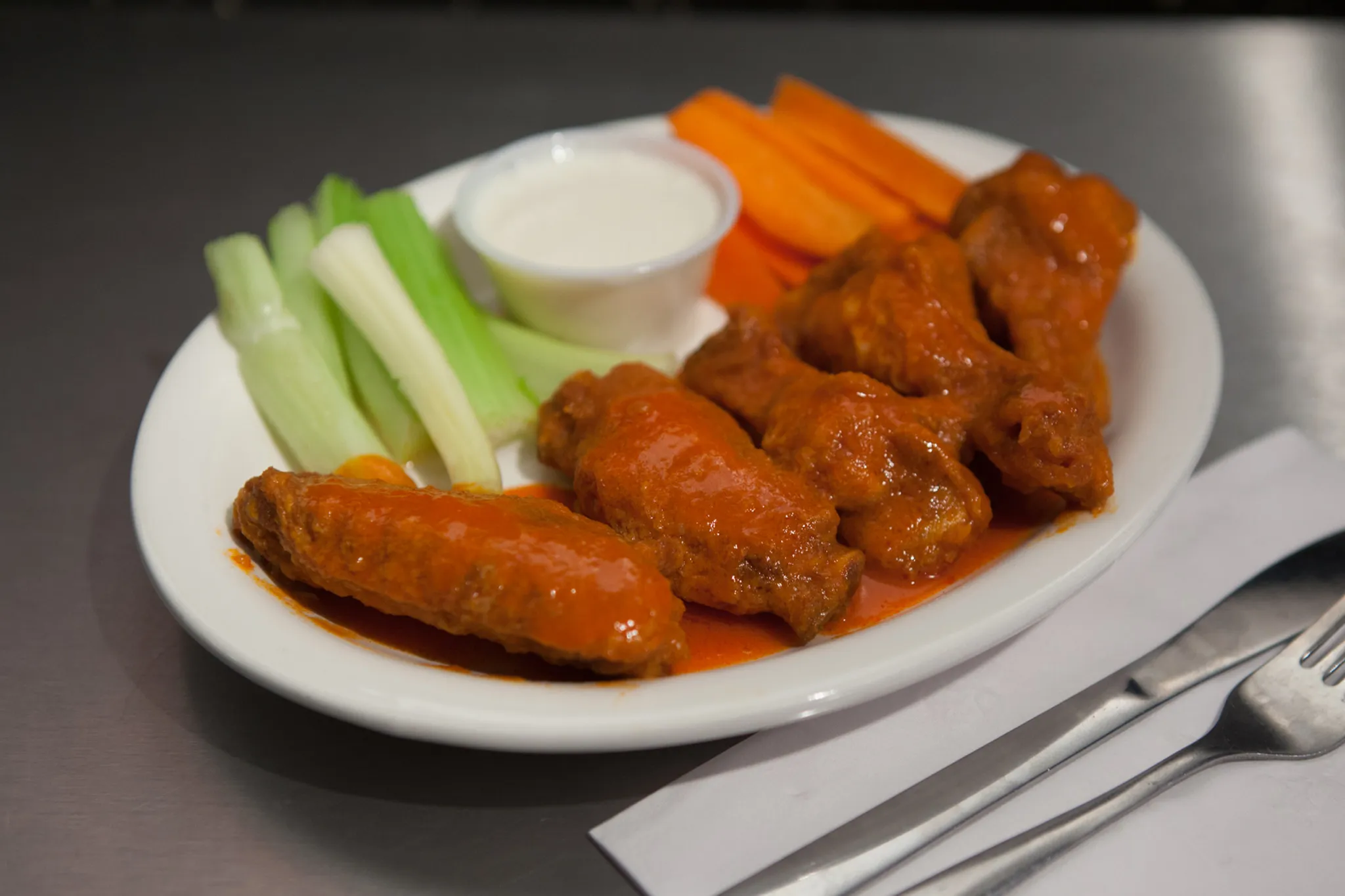 Bone-in Buffalo wings, middle sauce, Atomic Wings