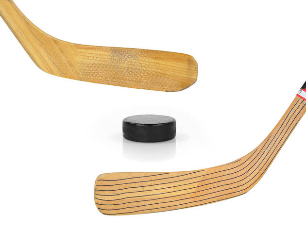 Hockey sticks and puck Hockey sticks and puck