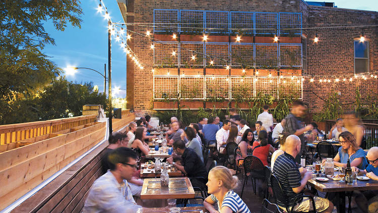 Grab a table at a rooftop restaurant