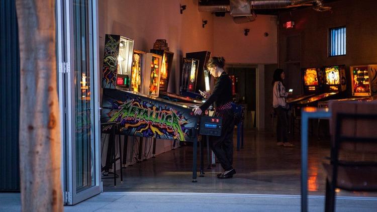 Mash buttons at an arcade bar