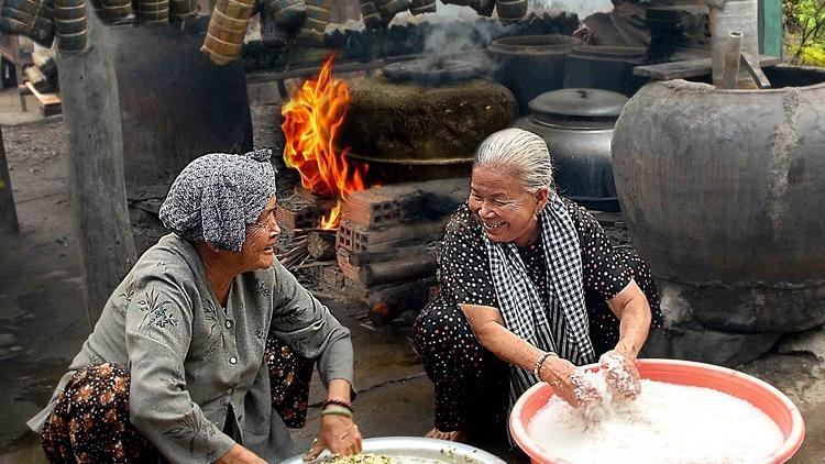 Tuan Nguyen  ('Two Old Ladies Preparing Tet’. Category winner: Food for Celebration)