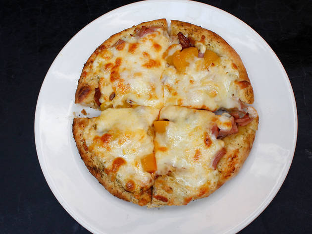 Pizza de chilaquiles (Pizzas del Perro Negro) Pizza de chilaquiles (Pizzas del Perro Negro)