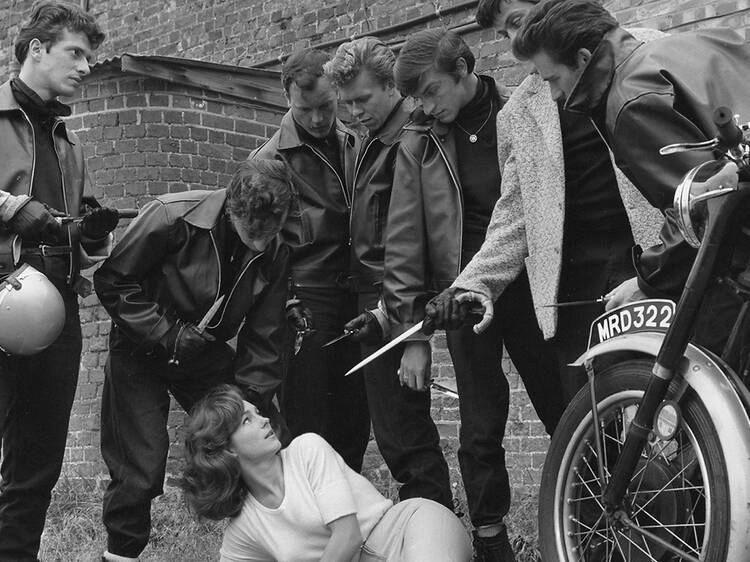 tough bikers fill an ordinary movie theater