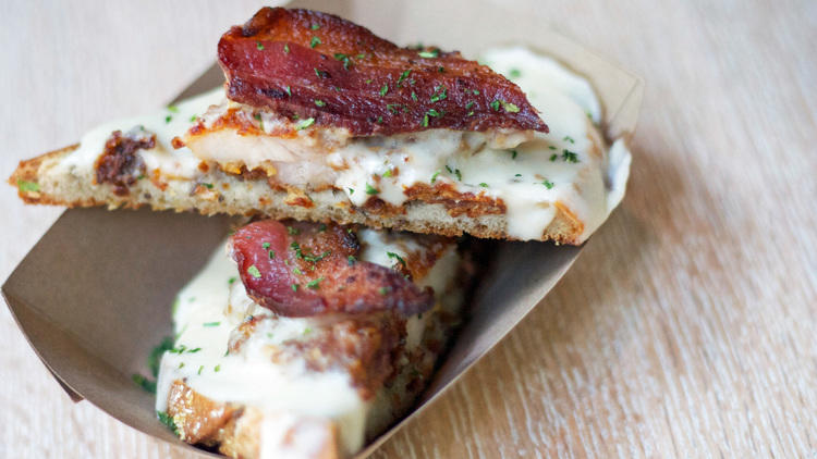 Kentucky Hot Brown with crispy chicken, bacon and cheese sauce