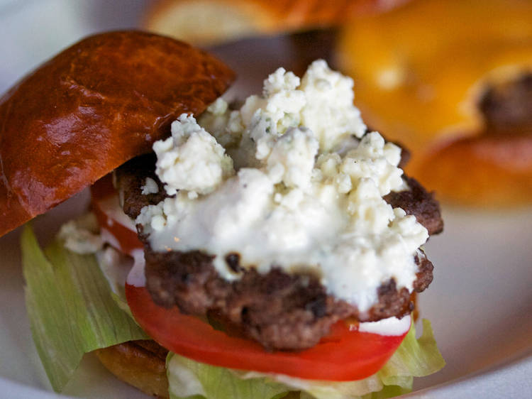 Burger with blue cheese, lettuce and tomato 