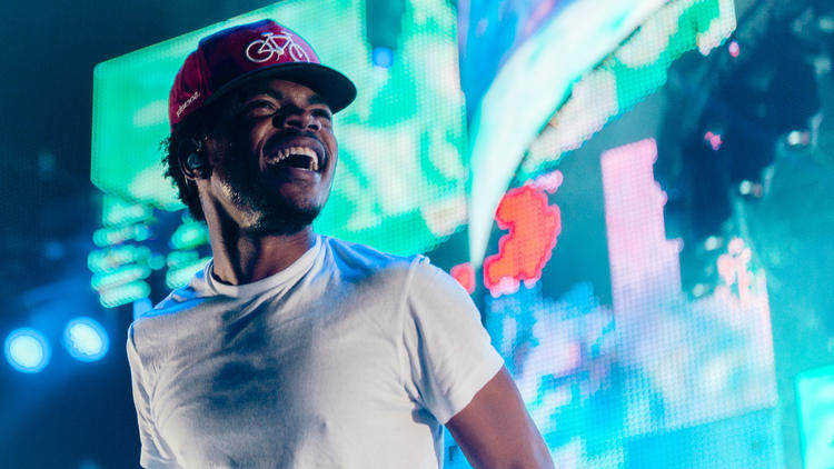 Chance the Rapper hits the stage in Grant Park to play a sold-out Lollapalooza Music Festival 2014.